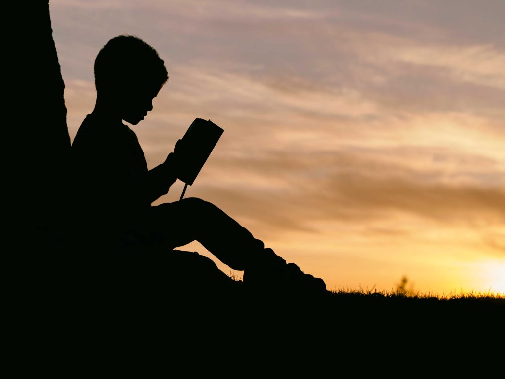 Reading the bible silhouette